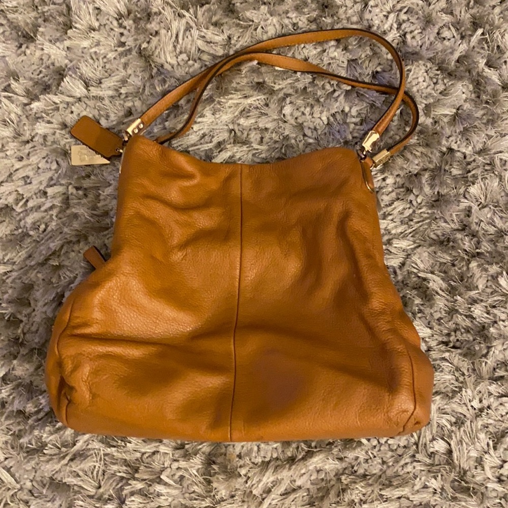 Coach tan satchel purse with zipper and magnet closures
